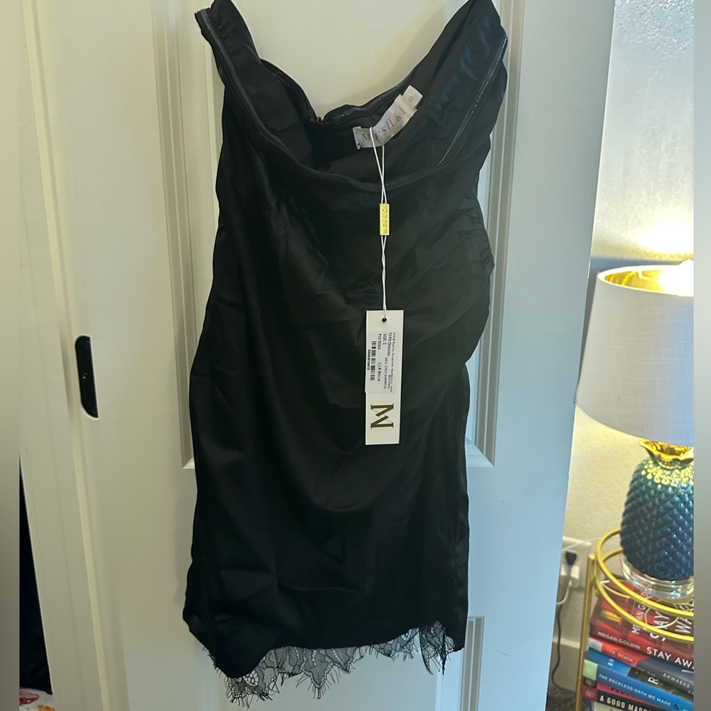 Strapless black dress with lace at bottom